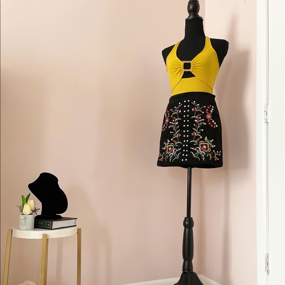 Embroidered black suede skirt